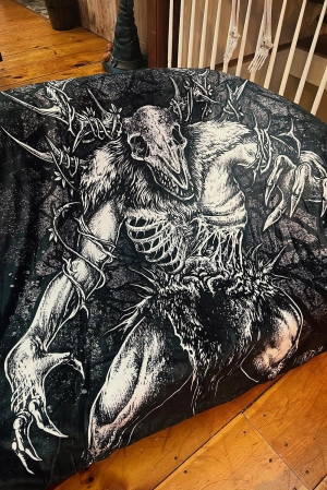Wendigo Throw Blanket